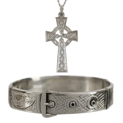 Lot 395 - A silver bangle and cross pendant necklace.