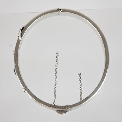 Lot 395 - A silver bangle and cross pendant necklace.