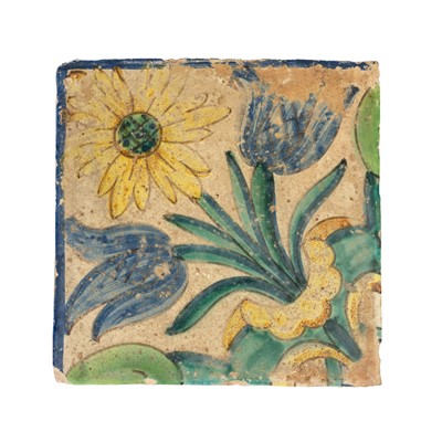 Lot 356 - A large and early tin glaze tile.