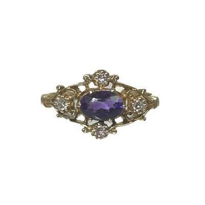 Lot 371 - A modern 9ct Edwardian style amethyst and diamond five-stone ring.