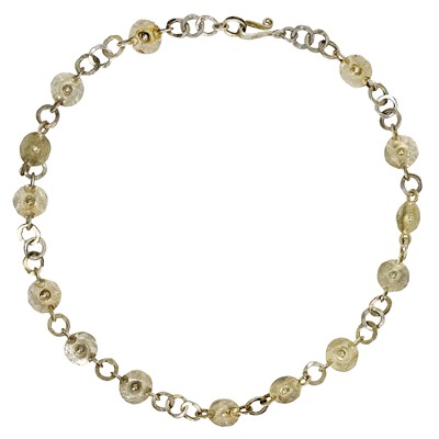 Lot 254 - A contemporary circular design necklace by Guy Royle.