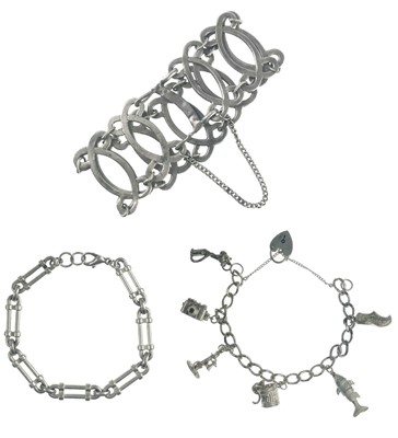 Lot 381 - A sterling silver charm bracelet with two other bracelets.