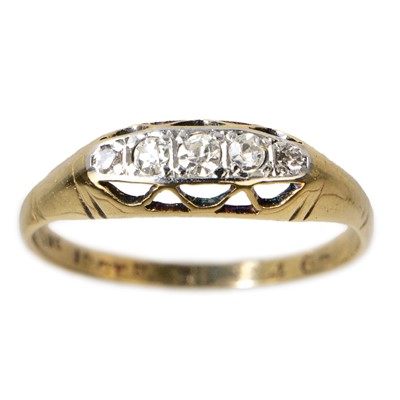 Lot 167 - An 18ct gold and platinum diamond ring.