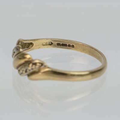 Lot 49 - Three 9ct gold patterned rings.