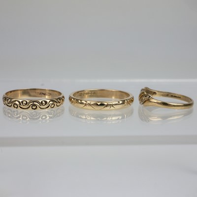 Lot 49 - Three 9ct gold patterned rings.