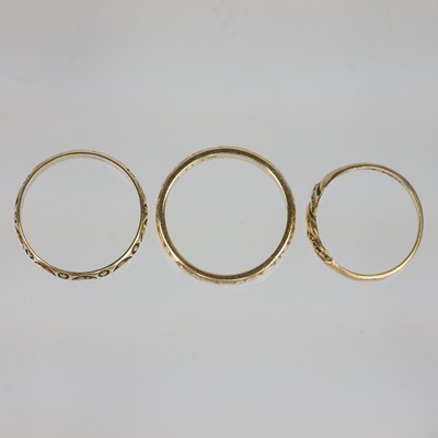 Lot 49 - Three 9ct gold patterned rings.