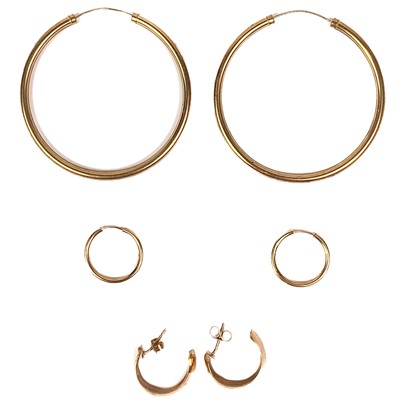 Lot 329 - Three pairs of 9ct hoop earrings.