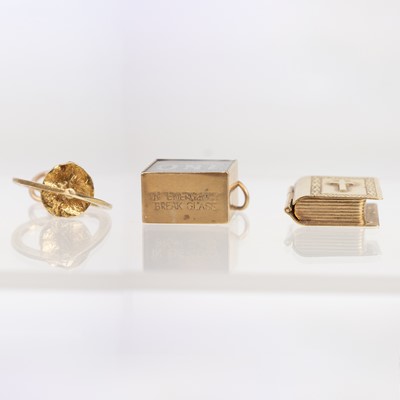 Lot 26 - Three 9ct gold charms.