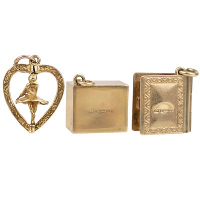 Lot 26 - Three 9ct gold charms.