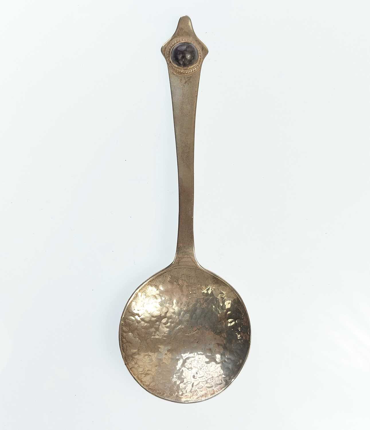 Lot 50 - An Arts & Crafts silver spoon set with a Blue John cabochon by Sandheim Brothers.