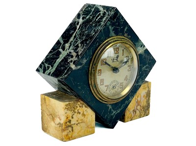 Lot 238 - An Art Deco marble alarm clock with Brevete movement.