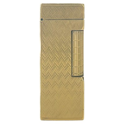 Lot 464 - An Alfred Dunhill 9ct gold engine turned lighter with fitted original box.