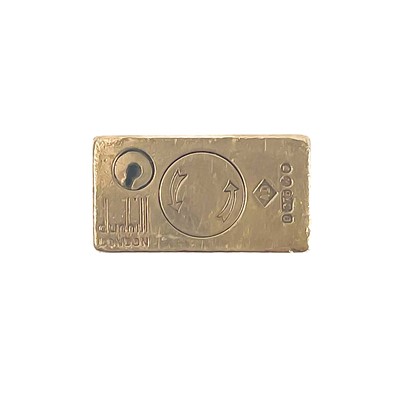 Lot 464 - An Alfred Dunhill 9ct gold engine turned lighter with fitted original box.
