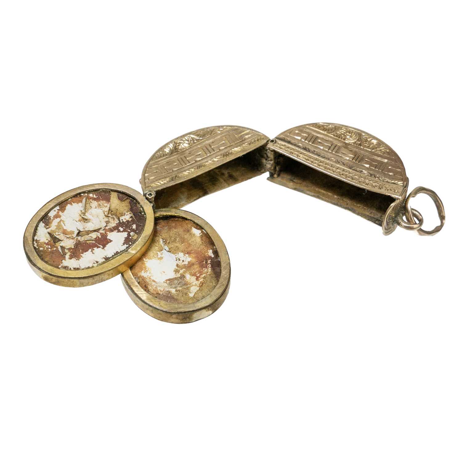 Lot 17 - A Victorian embossed gold central hinged