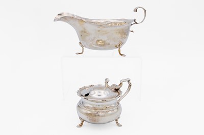 Lot 24 - A George V silver cream jug by George Nathan & Ridley Hayes.