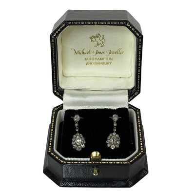 Lot 42 - A pair of 19th century silver diamond set pendant earrings.