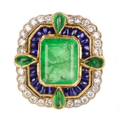 Lot 52 - An attractive 18ct diamond, emerald and sapphire set dress ring.