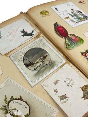 Lot 618 - A Victorian scrap album.