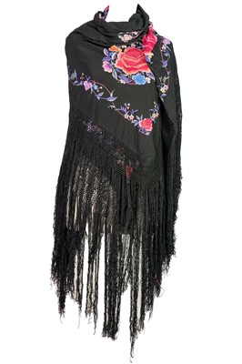 Lot 100 - A Chinese embroidered black silk shawl, 20th century.
