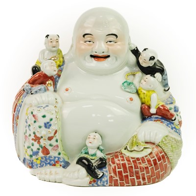 Lot 11 - A large Chinese porcelain model of Buddha, 20th century.