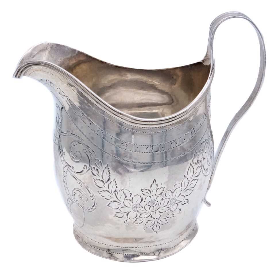 Lot 4 - A George III silver helmet form cream jug by Peter, Anne & William Bateman.