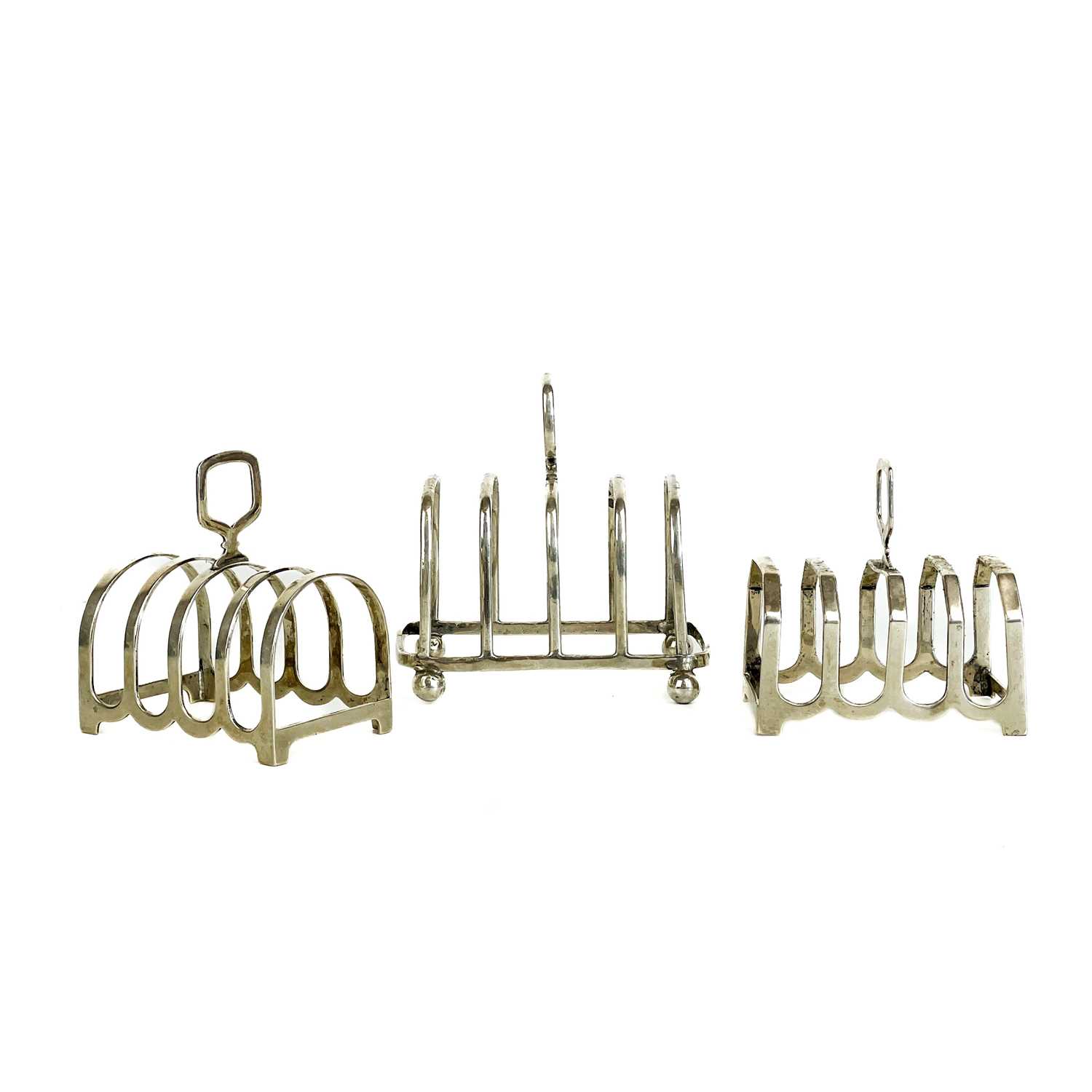 Lot 36 - Three silver hallmarked four section toast