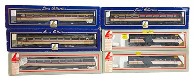 Lot 517 - "OO" Lima HST "Swallow" livery 3 un-motorised 125 power cars plus 9 compatible carriages (total 12)