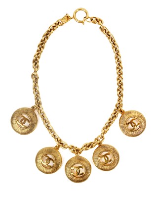 Lot 467 - A Chanel 24ct gold-plated CC five medallion necklace, circa 1990-91.