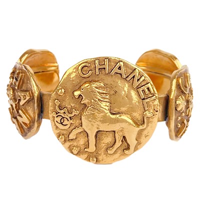 Lot 460 - A Chanel 24ct gold-plated five-medallion bangle, circa 1986.