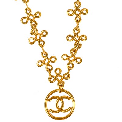 Lot 477 - A Chanel 24ct gold-plated CC medallion and knot link necklace, circa 1993.