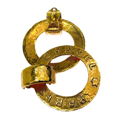 Lot 489 - A Chanel 24ct gold-plated pair of hoop earrings, circa 1988.