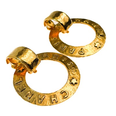 Lot 54 - A Chanel 24ct gold-plated pair of hoop earrings, circa 1988.