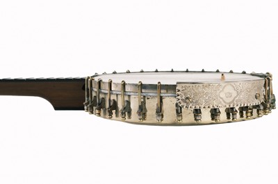 Lot 200 - A George P. Matthews seven string banjo.