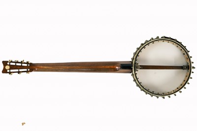 Lot 200 - A George P. Matthews seven string banjo.