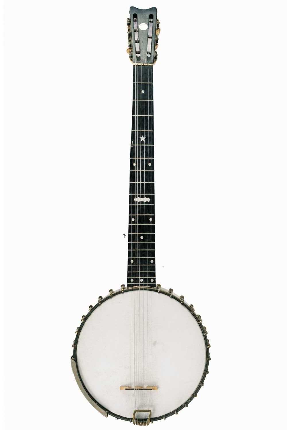 Lot 200 - A George P. Matthews seven string banjo.