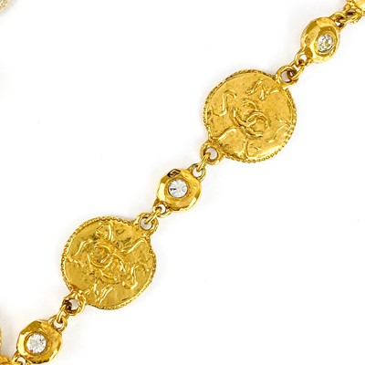 Lot 529 - A Chanel 24ct gold-plated crystal set medallion necklace, circa 1971-80.