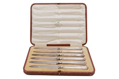 Lot 38 - A George V silver cased set of six fruit knives by James Dixon & Sons.