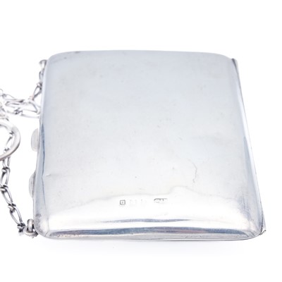 Lot 39 - A George V silver purse with chain.