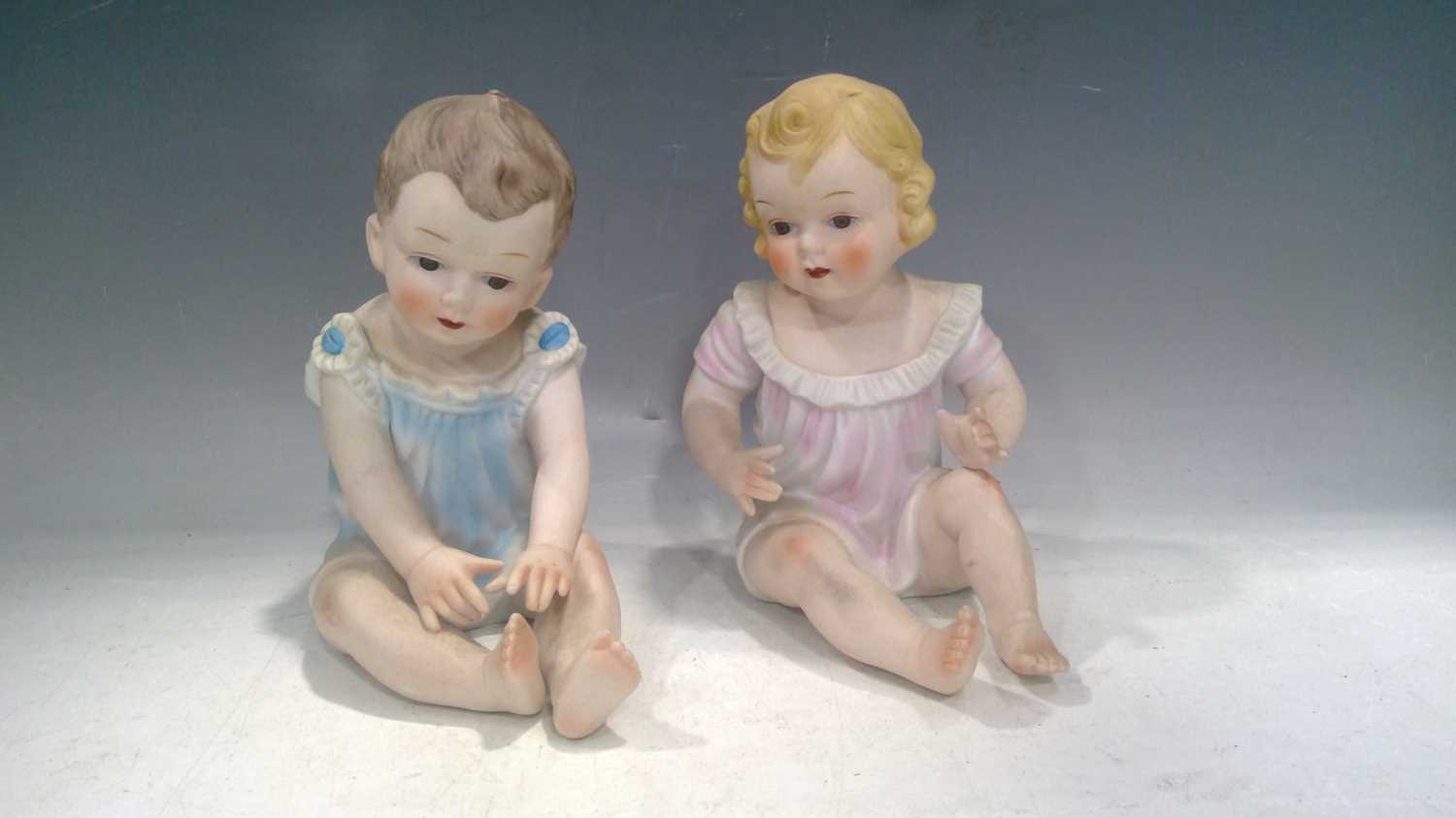 Lot 177 Two Bisque, Piano Babies. The Babies are