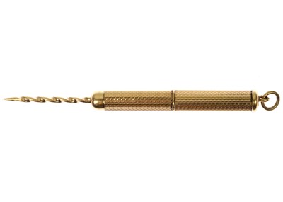 Lot 89 - ASPREY & CO - A 9ct engine turned propelling toothpick fob.