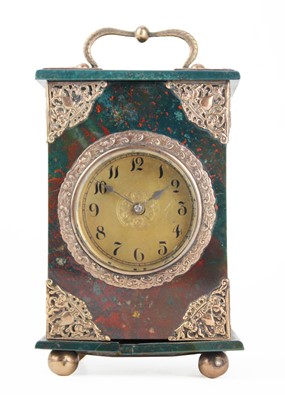 Lot 370 - A French bloodstone gold-mounted small clock.