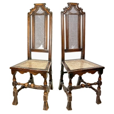 Lot 279 - A pair of Charles II style walnut and stained beech side chairs.