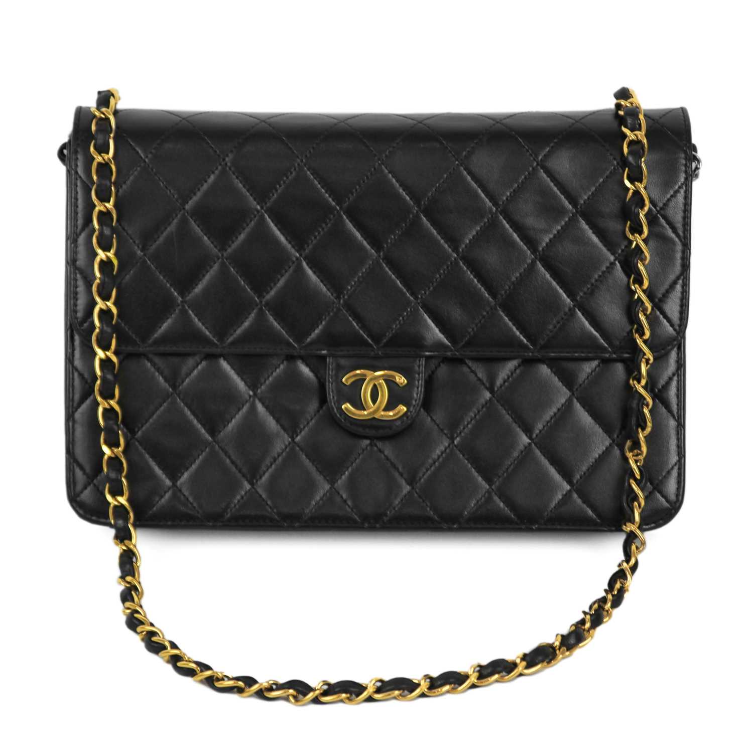 Lot 12 - A Chanel black quilted lambskin single flap wallet shoulder bag.