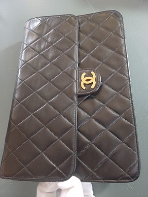 Lot 388 - A Chanel black quilted lambskin single flap wallet shoulder bag.