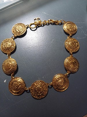 Lot 383 - A Chanel 24ct gold-plated medallion necklace, circa 1990-91.