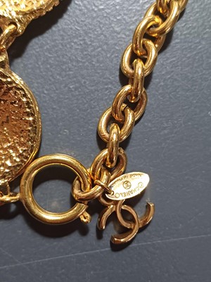 Lot 383 - A Chanel 24ct gold-plated medallion necklace, circa 1990-91.