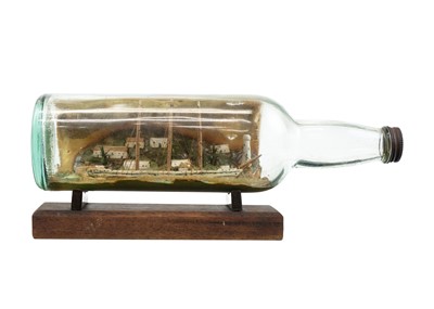 Lot 262 - A model ship in a bottle.