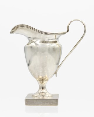 Lot 54 - A George V silver pedestal cream jug.