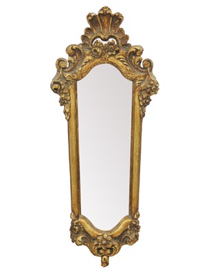 Lot 138 - A wood carved gilt mirror.