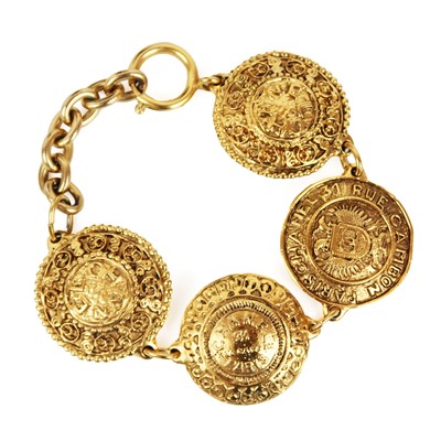 Lot 513A - A Chanel 24ct gold-plated medallion bracelet, circa 1990-91.